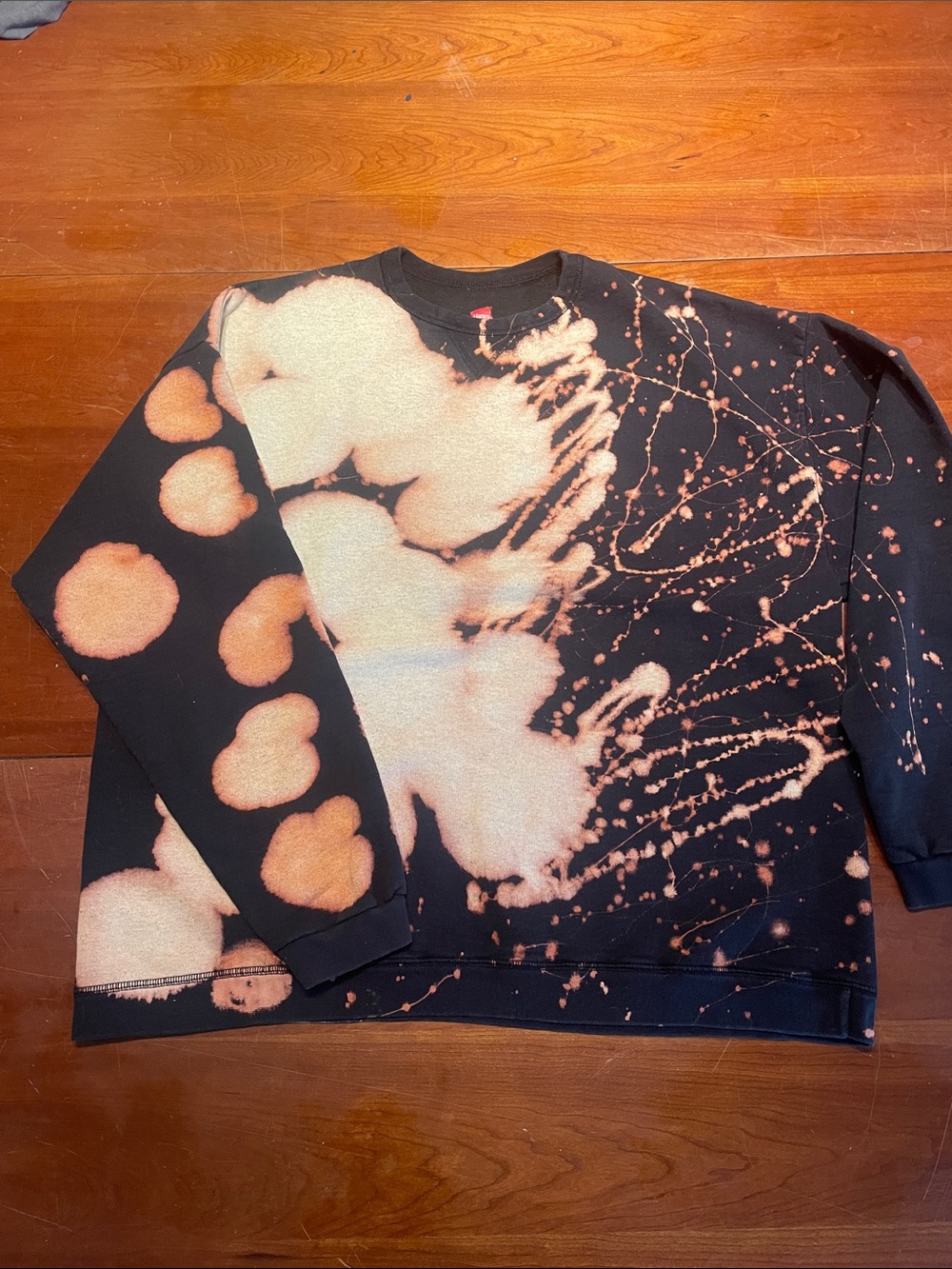 Black Sweatshirt with Peach Bleach-Splash Pattern